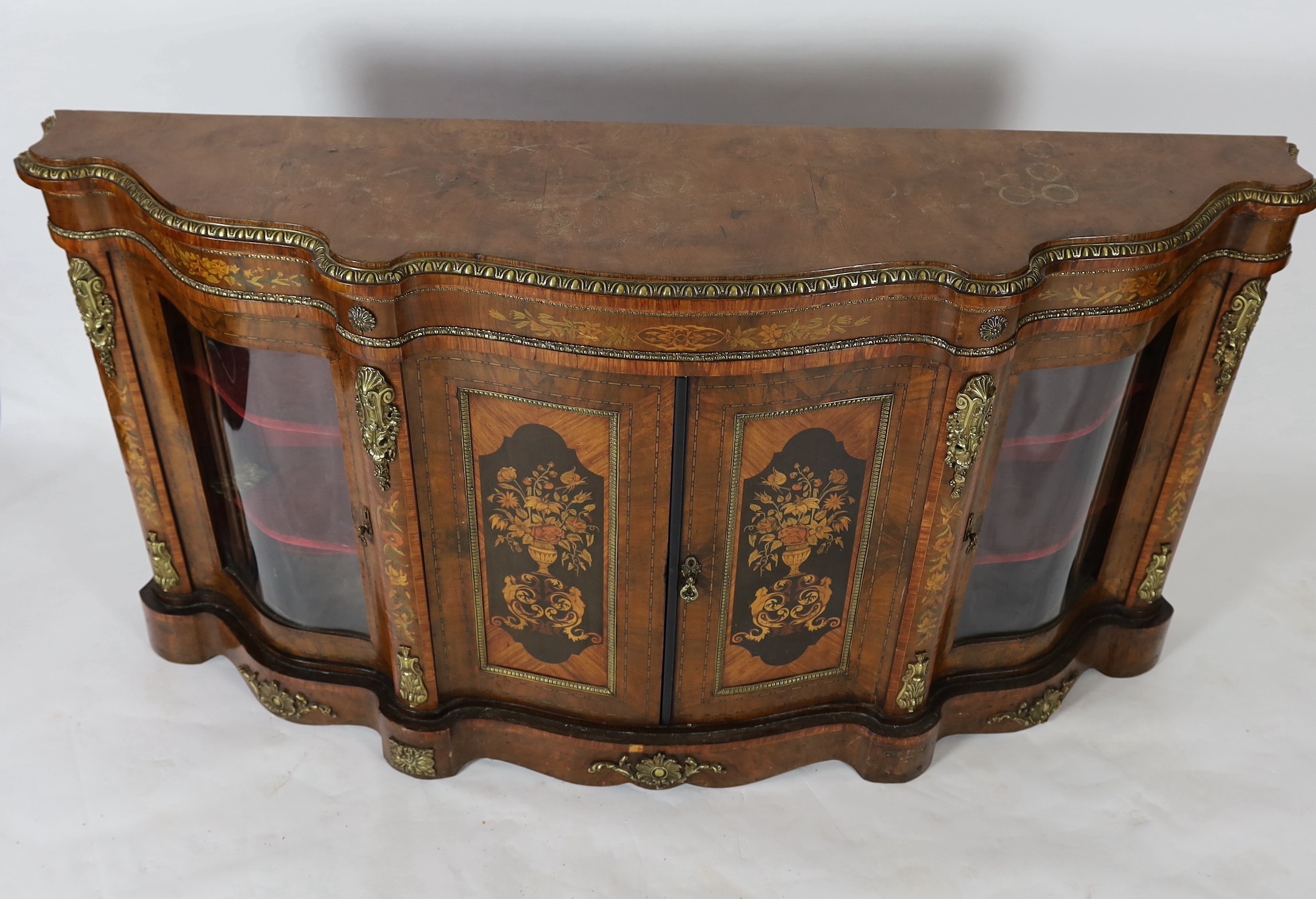 A Victorian marquetry inlaid walnut serpentine front credenza, W.200cm D.47cm H.110cm